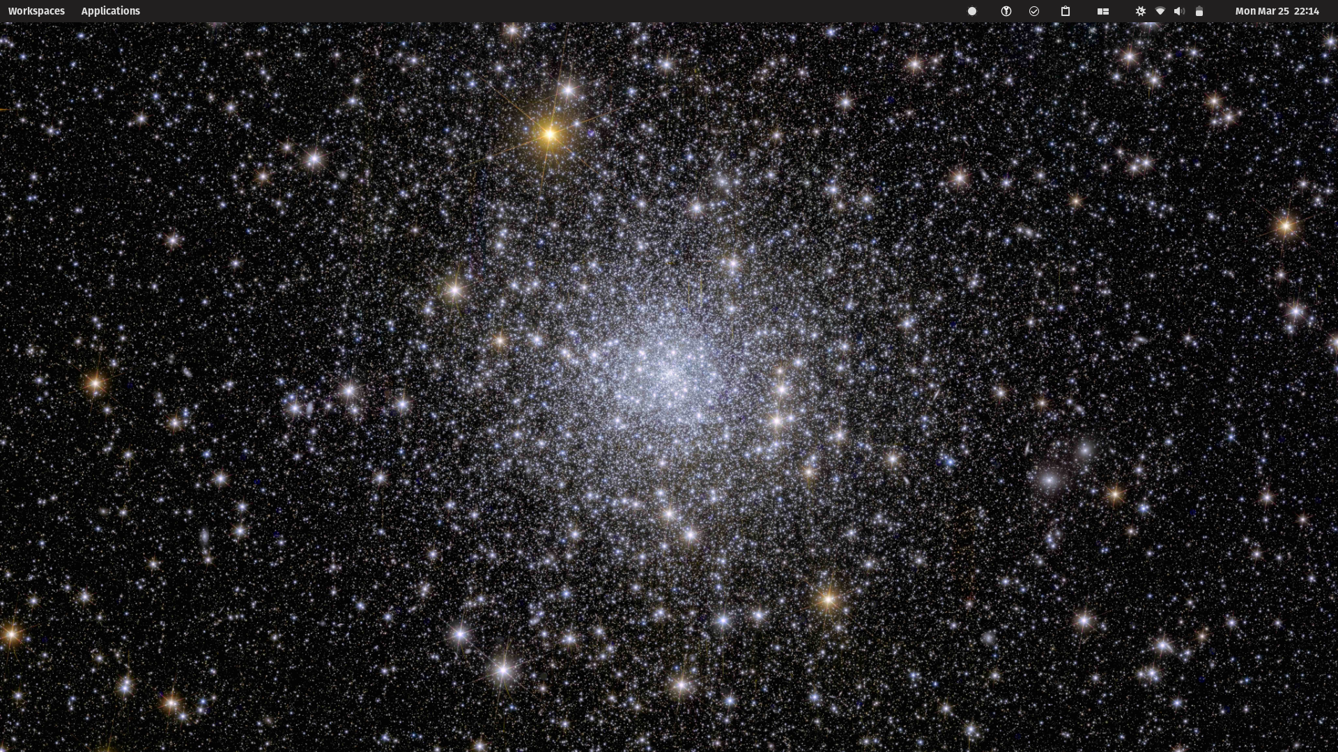 Empty desktop with a background image of a star cluster